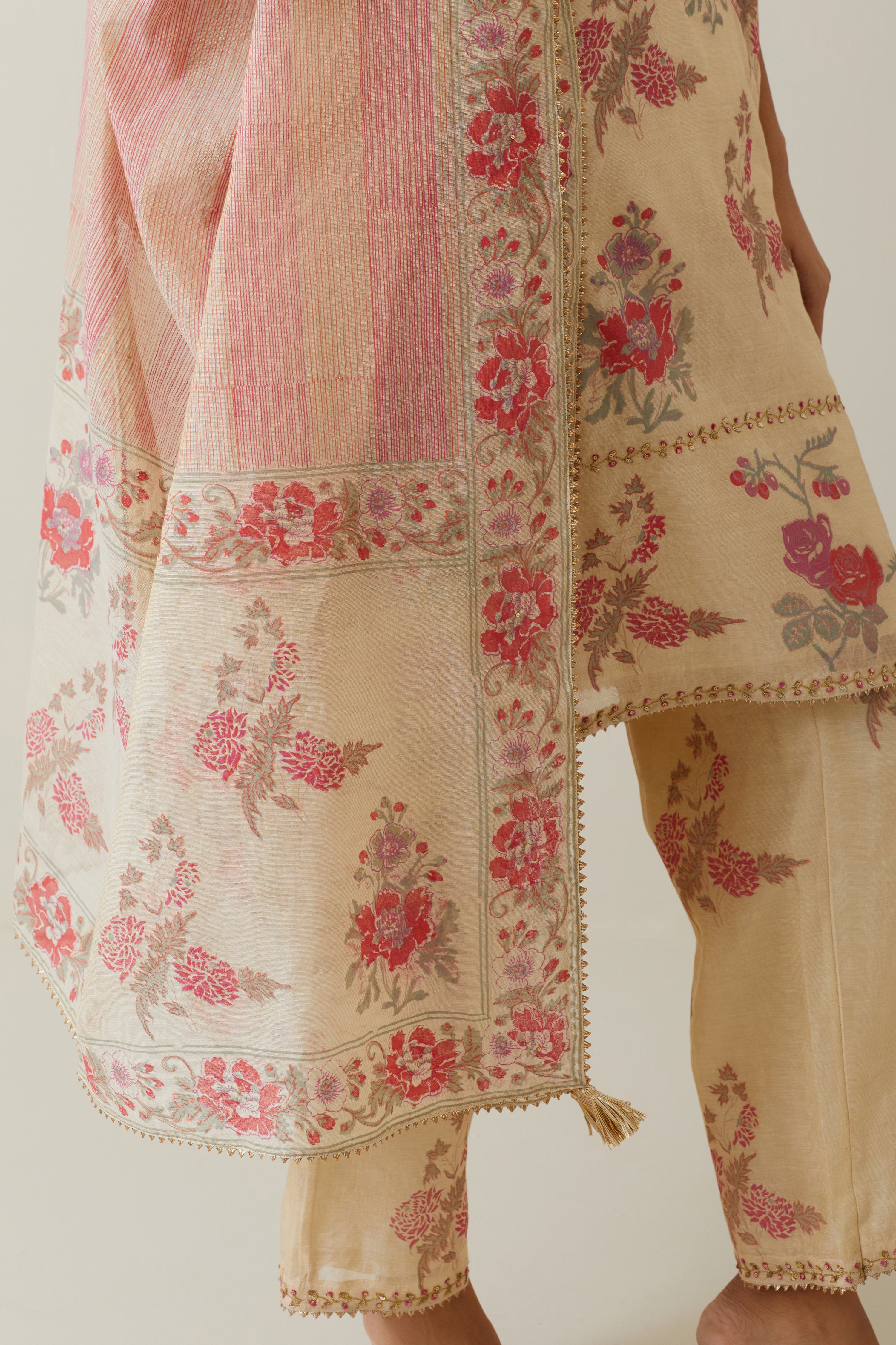 Beige tissue chanderi hand block printed A-line short kurta set.