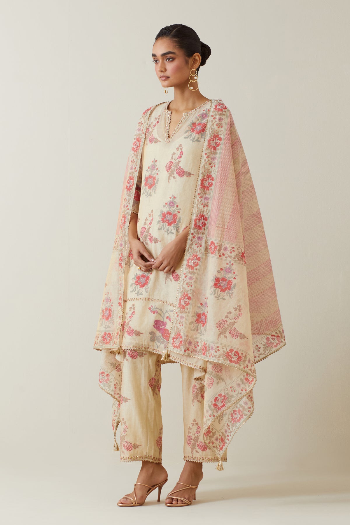 Beige tissue chanderi hand block printed A-line short kurta set.