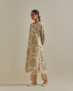 Yellow and off-white cotton chanderi straight kurta set with all over patchwork, silk thread, mirror, tassels and sequins embroidery.