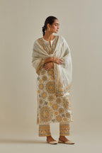 Yellow and off-white cotton chanderi straight kurta set with all over patchwork, silk thread, mirror, tassels and sequins embroidery.