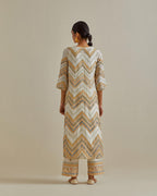 Yellow and off-white cotton chanderi straight kurta set with all over chevron pattern. It is embellished with silk patchwork, thread, sequins and mirrors.