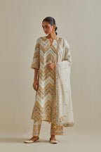 Yellow and off-white cotton chanderi straight kurta set with all over chevron pattern. It is embellished with silk patchwork, thread, sequins and mirrors.