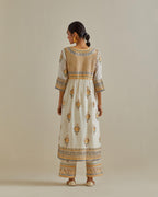 Yellow and off-white cotton chanderi embroidered kurta dress set with V neck, yoke and fine gathers at empire line.