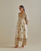 Yellow and off-white cotton chanderi embroidered kurta dress set with V neck, yoke and fine gathers at empire line.