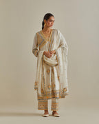 Yellow and off-white cotton chanderi embroidered kurta dress set with V neck, yoke and fine gathers at empire line.