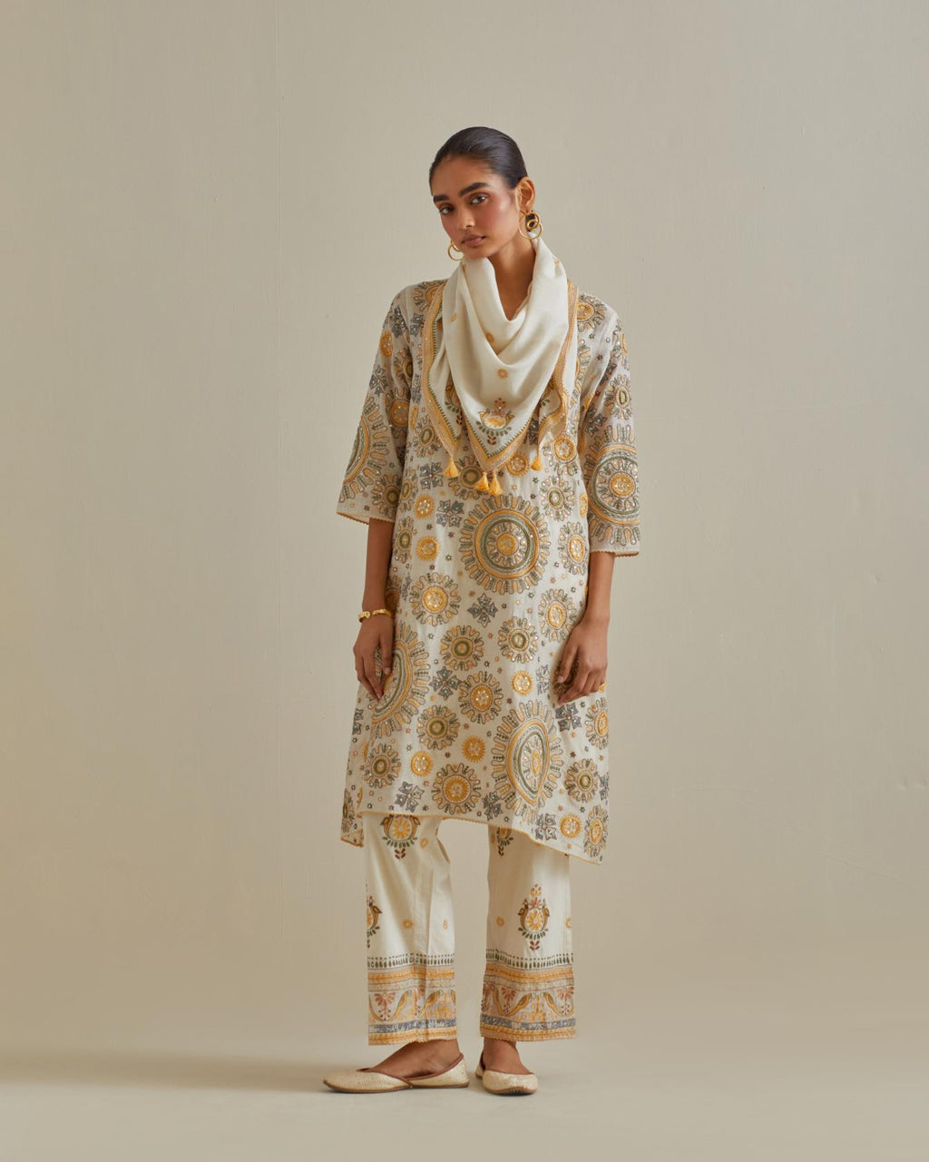 Yellow & off-white cotton square scarf with delicate silk thread embroidery, highlighted with braids, mirrors and sequins work.