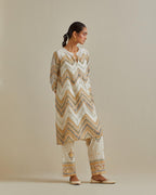 Yellow and off-white cotton chanderi A-line kurta set with all over embroidery set in bold chevron stripes.