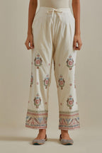 Pink and off-white straight pants with all over multi color embroidery detailed with sequins.