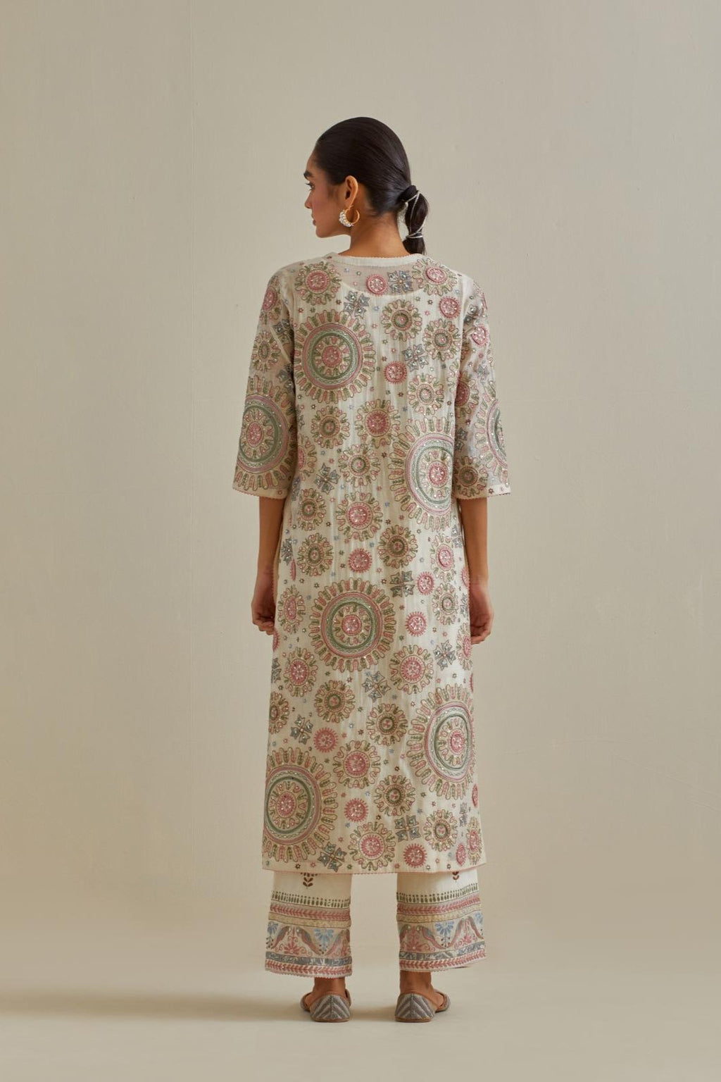 Pink and off-white cotton chanderi straight kurta set with all over patchwork, silk thread, mirror, tassels and sequins embroidery.