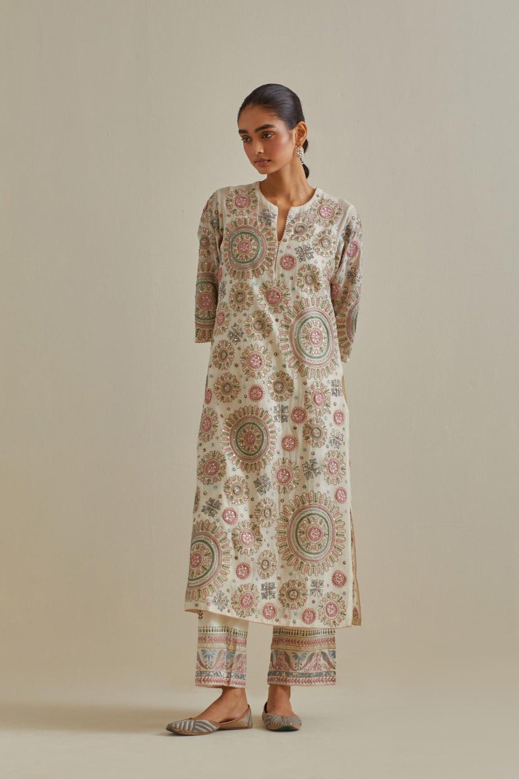 Pink and off-white cotton chanderi straight kurta set with all over patchwork, silk thread, mirror, tassels and sequins embroidery.