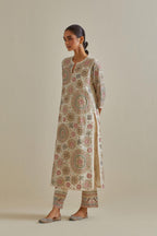 Pink and off-white cotton chanderi straight kurta set with all over patchwork, silk thread, mirror, tassels and sequins embroidery.