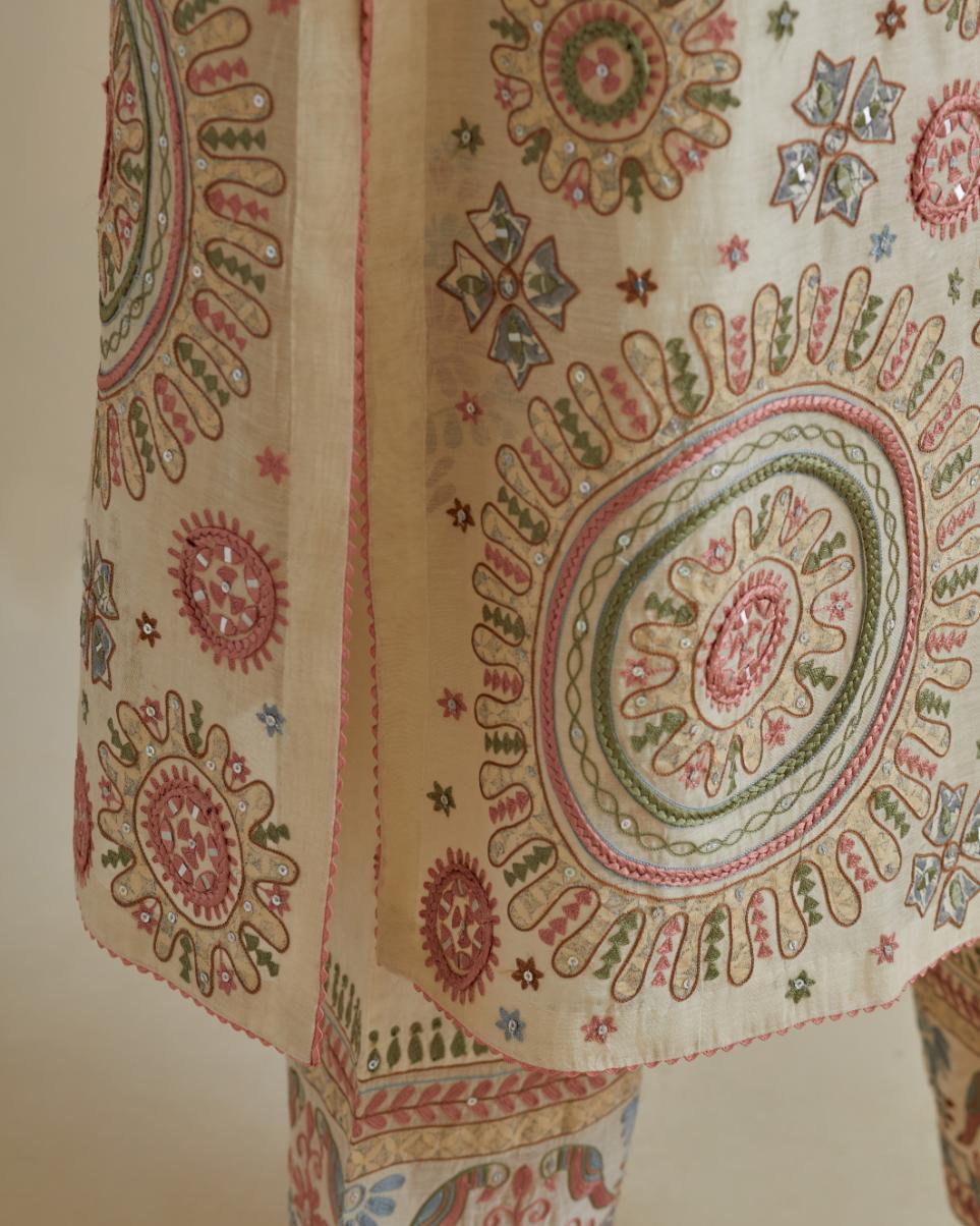 Pink and off-white cotton chanderi straight kurta set with all over patchwork, silk thread, mirror, tassels and sequins embroidery.