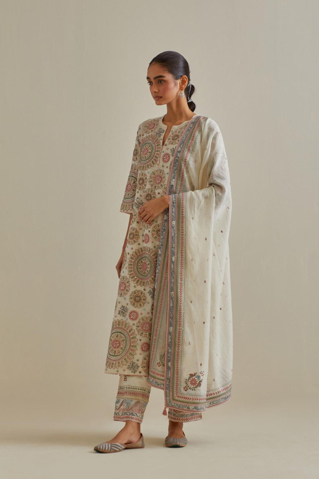 Pink and off-white cotton chanderi straight kurta set with all over patchwork, silk thread, mirror, tassels and sequins embroidery.