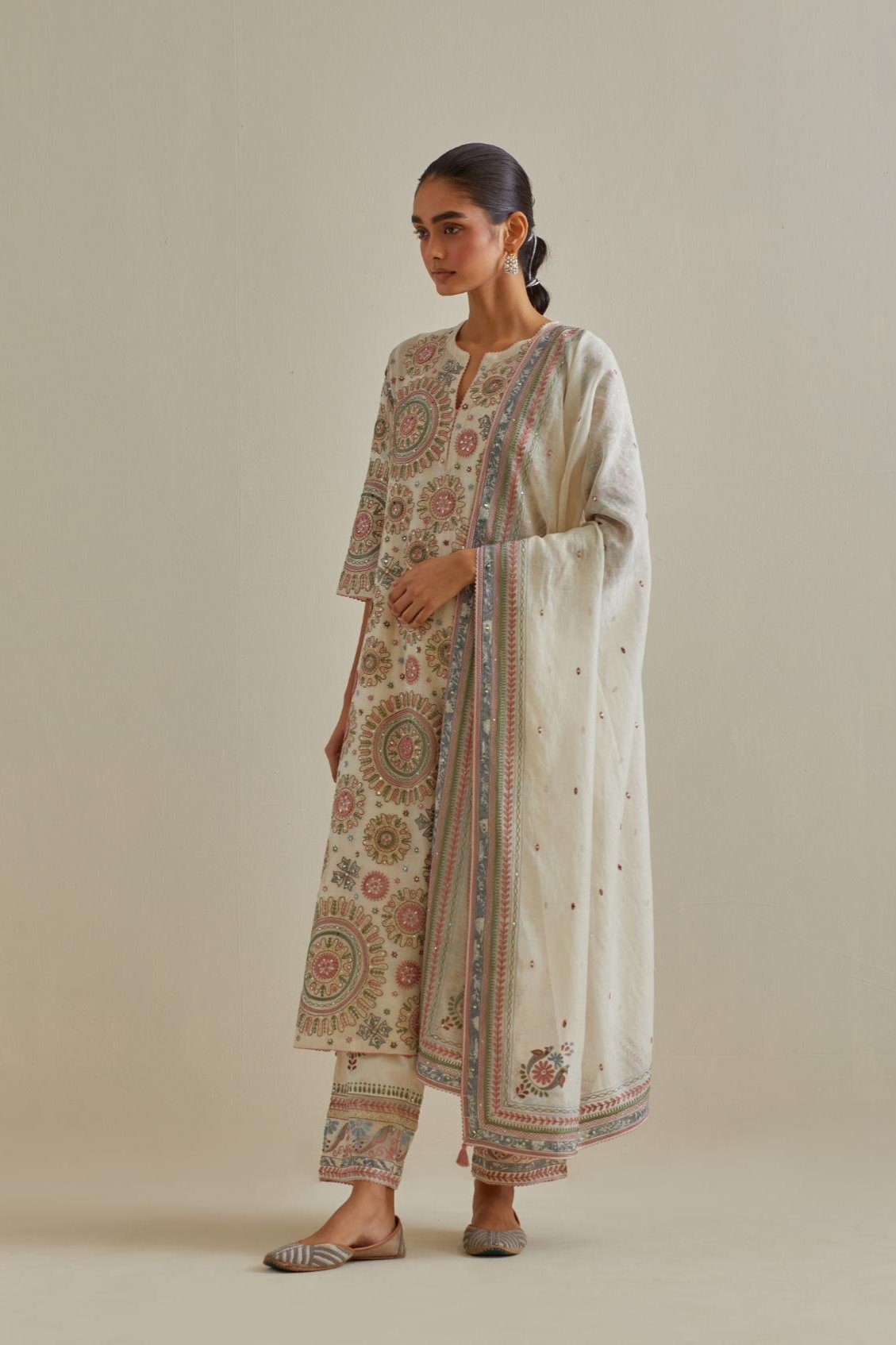Pink and off-white cotton chanderi straight kurta set with all over patchwork, silk thread, mirror, tassels and sequins embroidery.