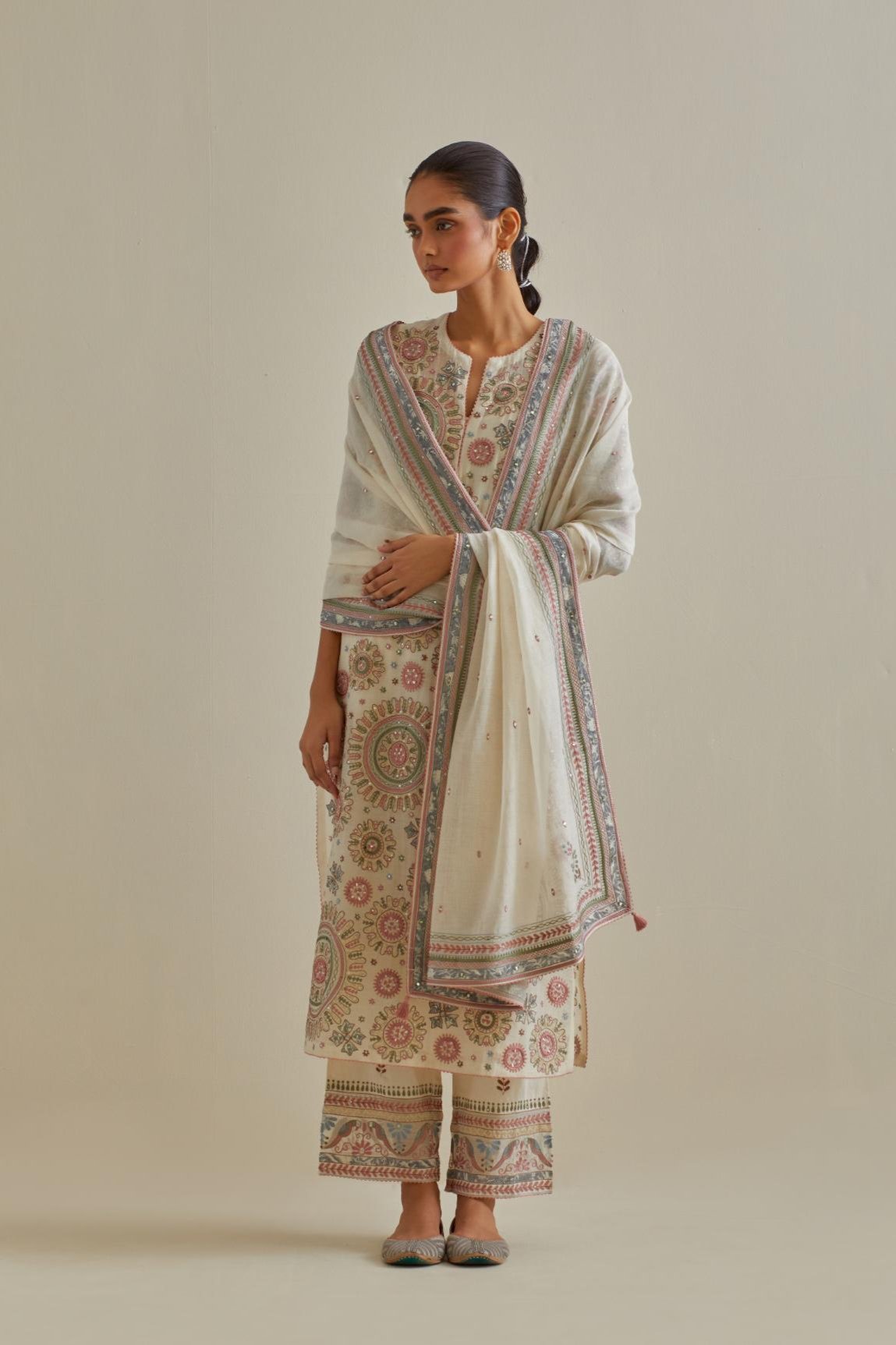 Pink and off-white cotton chanderi straight kurta set with all over patchwork, silk thread, mirror, tassels and sequins embroidery.