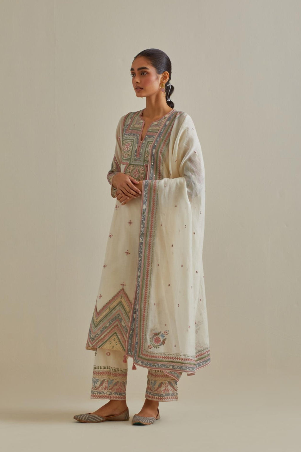 Pink and off-white cotton chanderi dupatta with delicate silk thread embroidery, highlighted with braids, mirrors and sequins work.