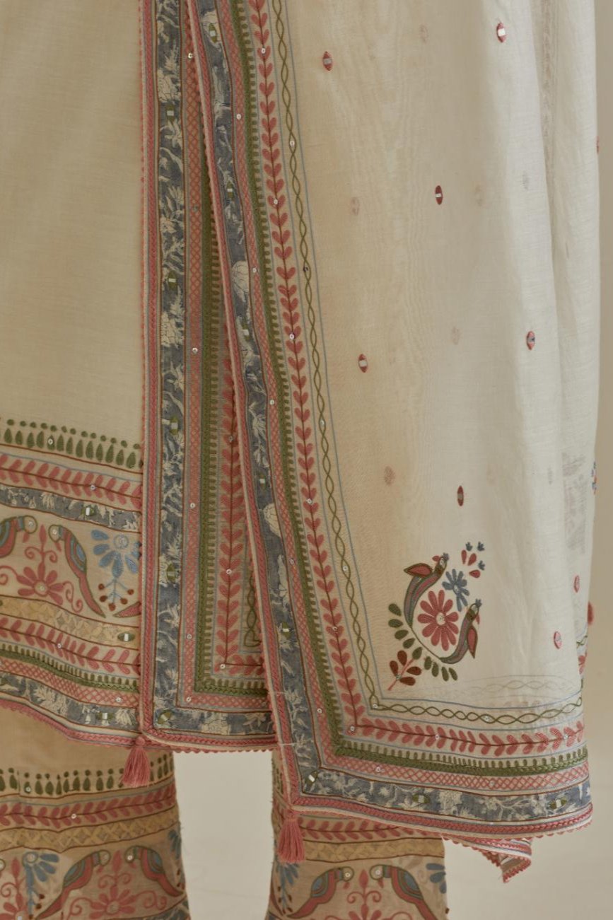 Pink and off-white cotton chanderi straight kurta set with yoke with patchwork and silk thread embroidery highlighted with mirror, sequins, tassels and braids.