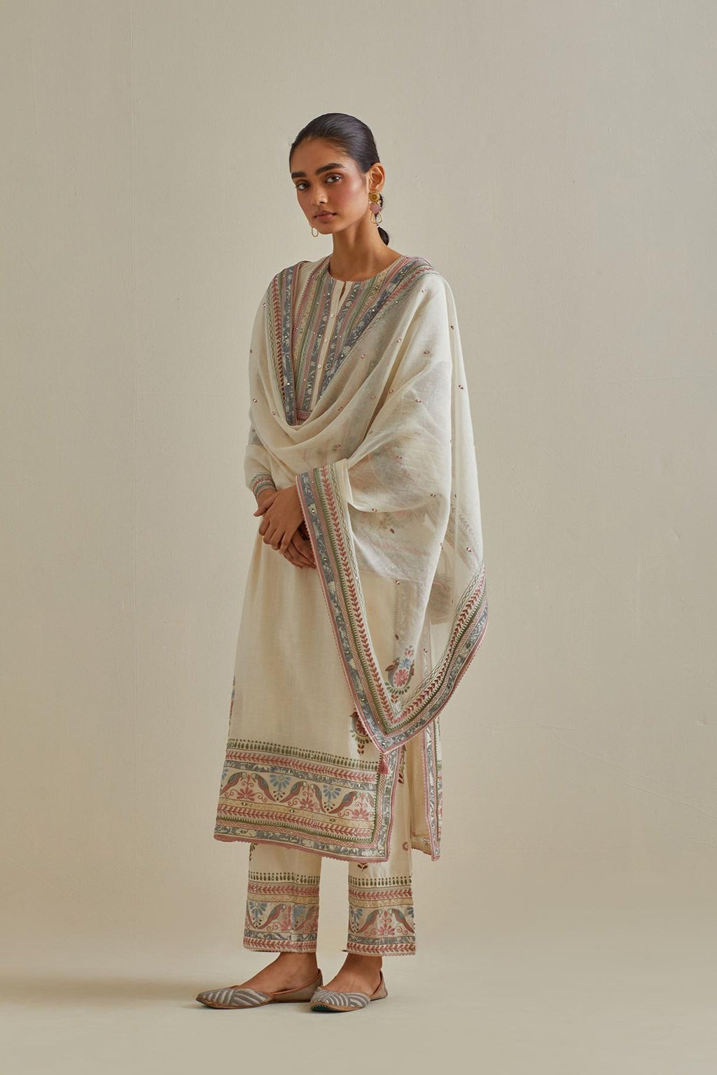 Pink and off-white cotton chanderi dupatta with delicate silk thread embroidery, highlighted with braids, mirrors and sequins work.
