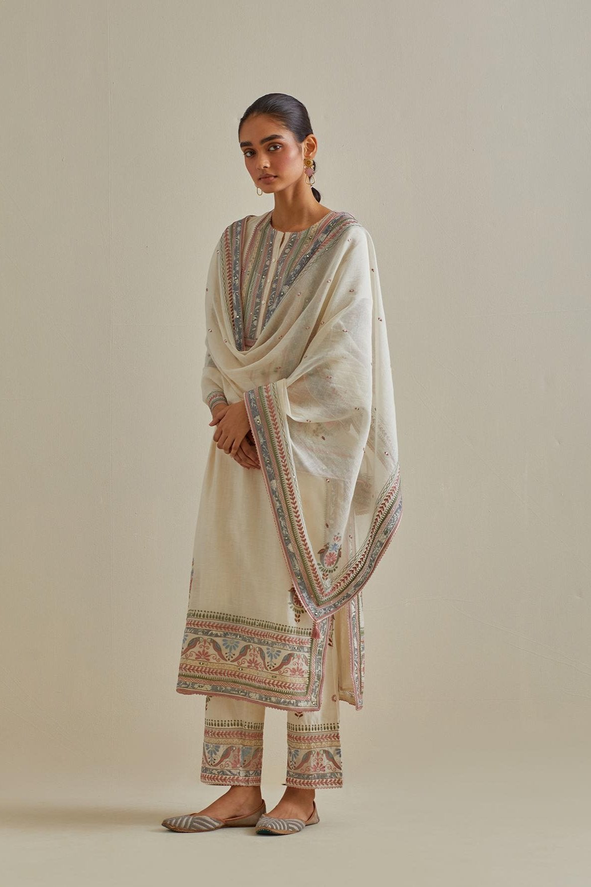 Pink and off-white cotton chanderi dupatta with delicate silk thread embroidery, highlighted with braids, mirrors and sequins work.