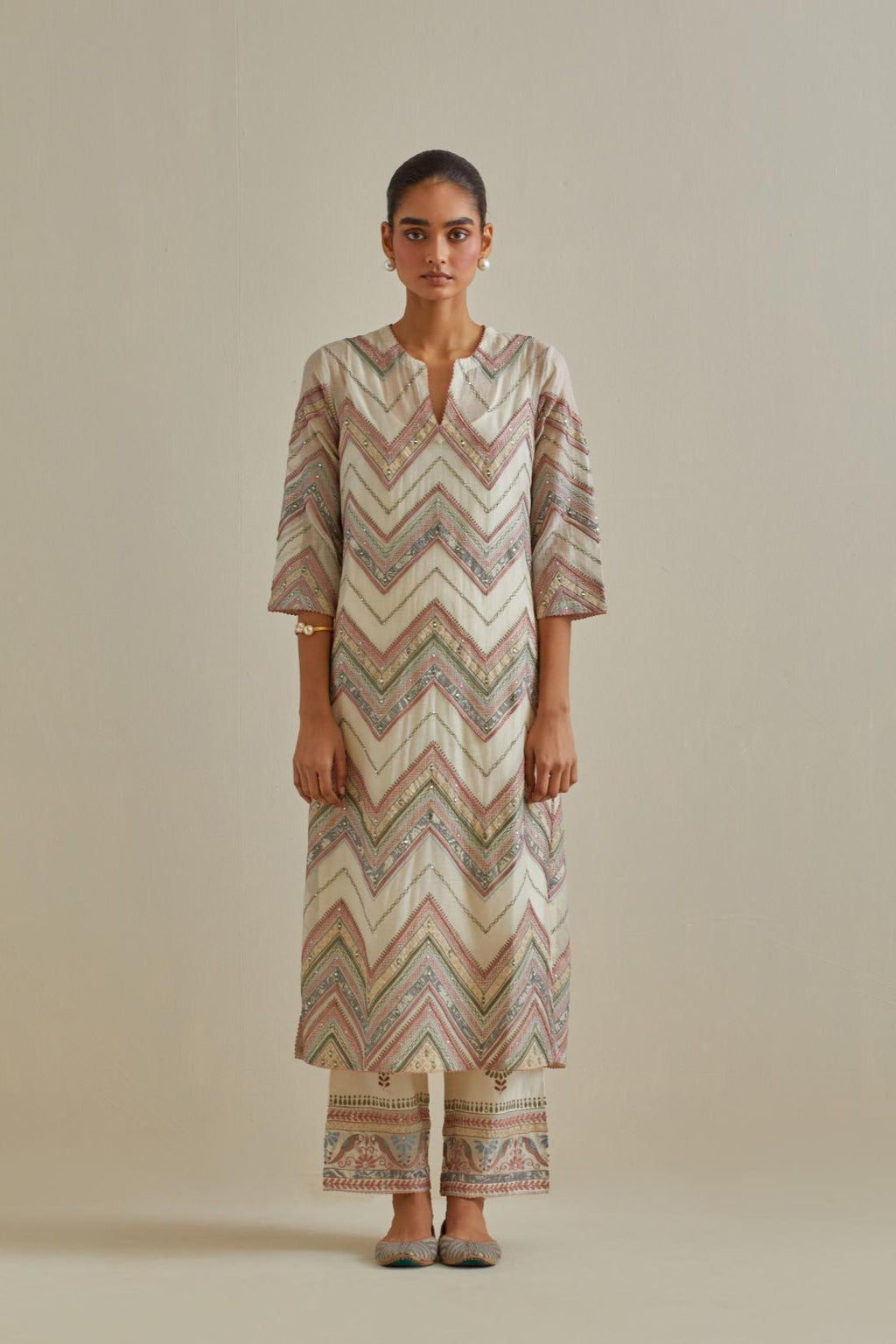 Pink and off-white cotton chanderi straight kurta set with all over chevron pattern. It is embellished with silk patchwork, thread, sequins and mirrors.