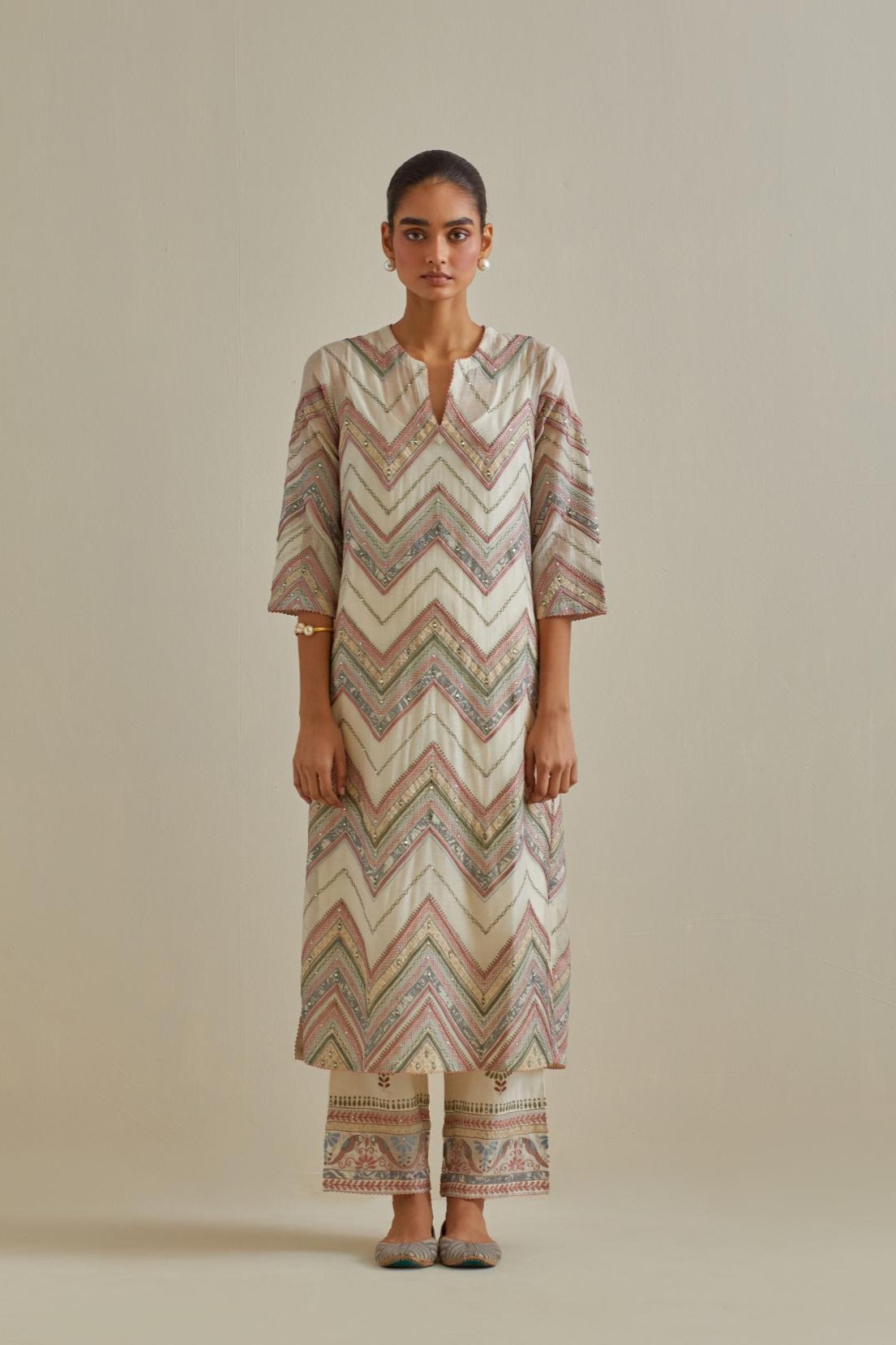 Pink and off-white cotton chanderi straight kurta set with all over chevron pattern. It is embellished with silk patchwork, thread, sequins and mirrors.