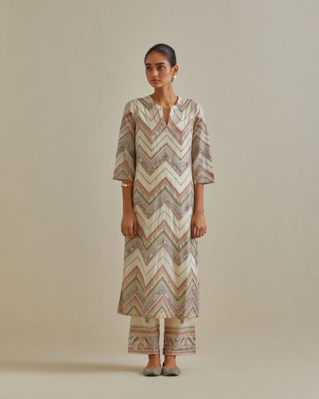 Pink and off-white cotton chanderi straight kurta set with all over chevron pattern. It is embellished with silk patchwork, thread, sequins and mirrors.