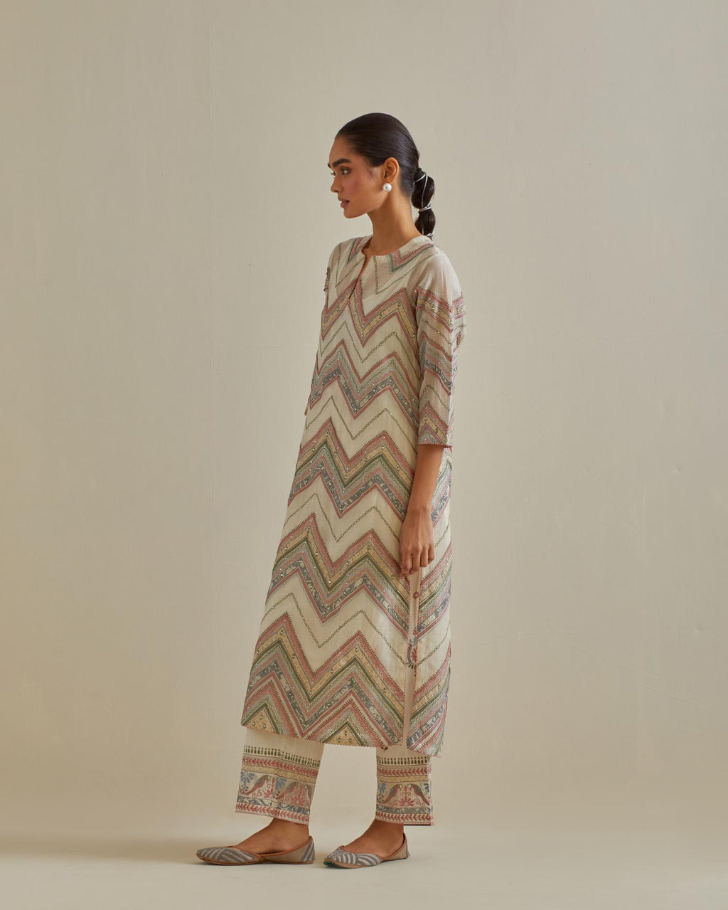 Pink and off-white cotton chanderi straight kurta set with all over chevron pattern. It is embellished with silk patchwork, thread, sequins and mirrors.