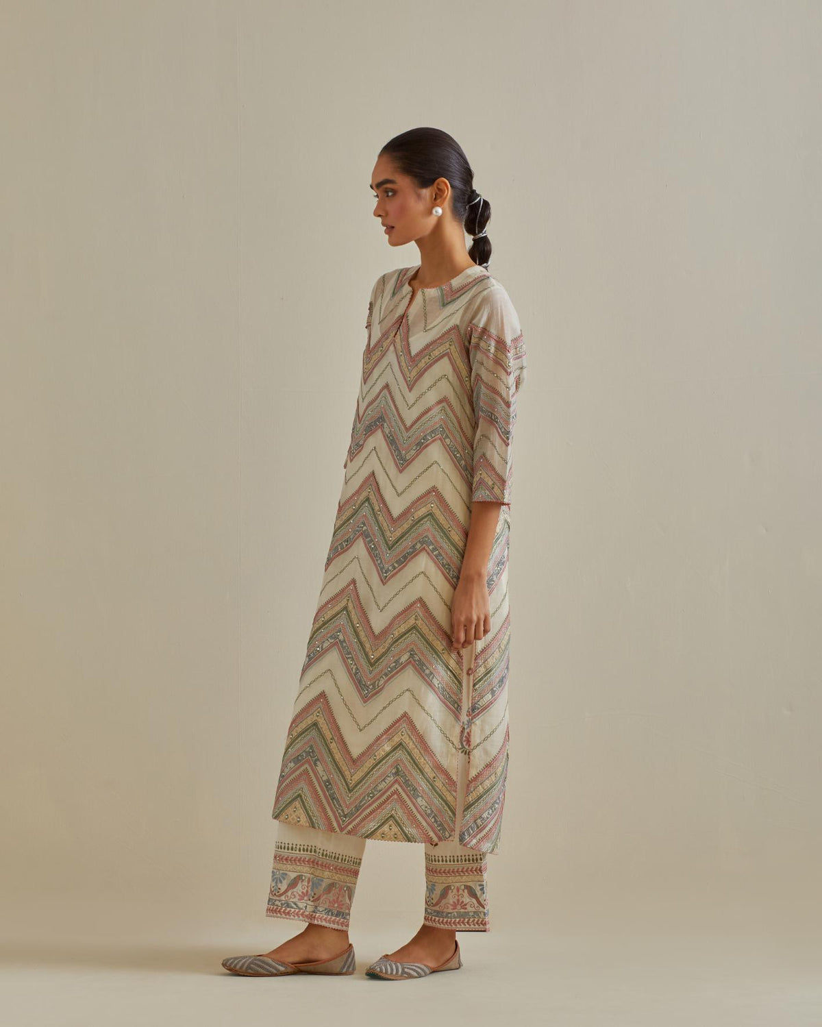 Pink and off-white cotton chanderi straight kurta set with all over chevron pattern. It is embellished with silk patchwork, thread, sequins and mirrors.