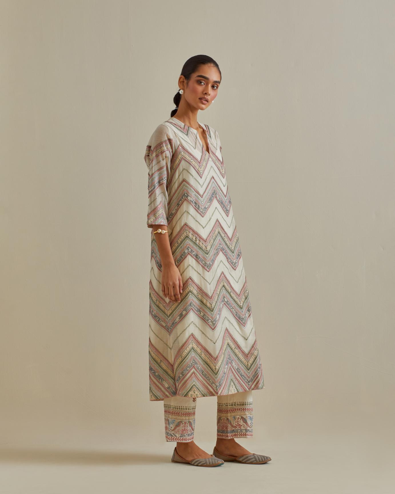 Pink and off-white cotton chanderi straight kurta set with all over chevron pattern. It is embellished with silk patchwork, thread, sequins and mirrors.