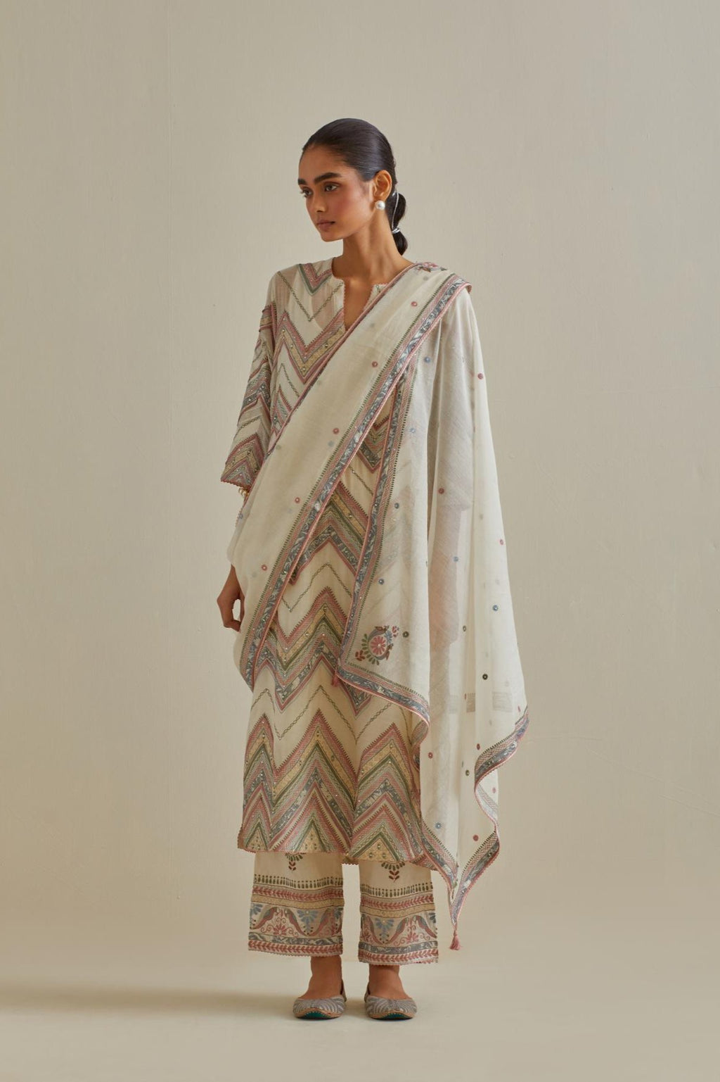 Pink and off-white cotton chanderi straight kurta set with all over chevron pattern. It is embellished with silk patchwork, thread, sequins and mirrors.