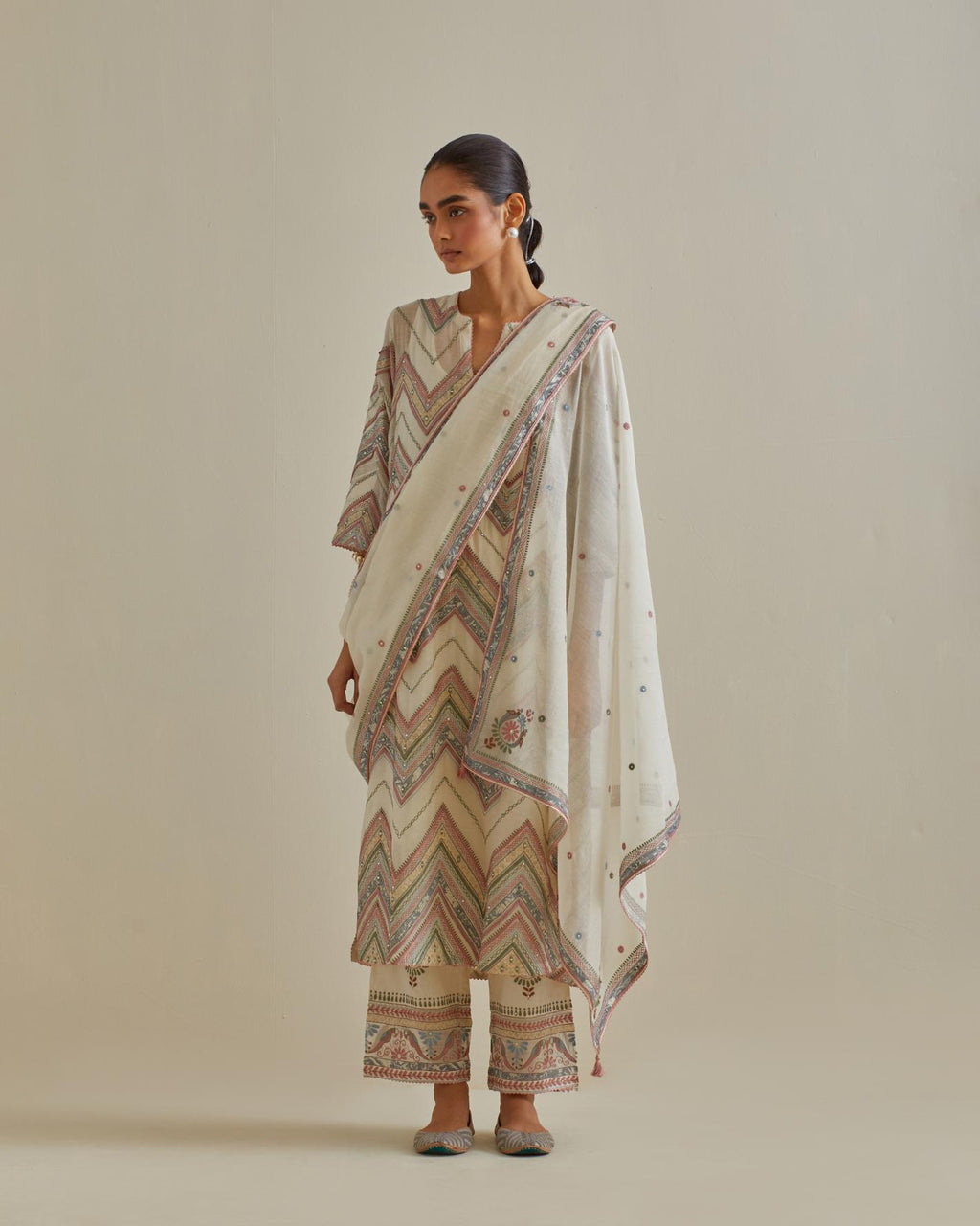 Pink and off-white cotton chanderi straight kurta set with all over chevron pattern. It is embellished with silk patchwork, thread, sequins and mirrors.