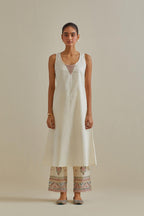 Pink and off-white cotton chanderi embroidered kurta dress set with V neck, yoke and fine gathers at empire line.
