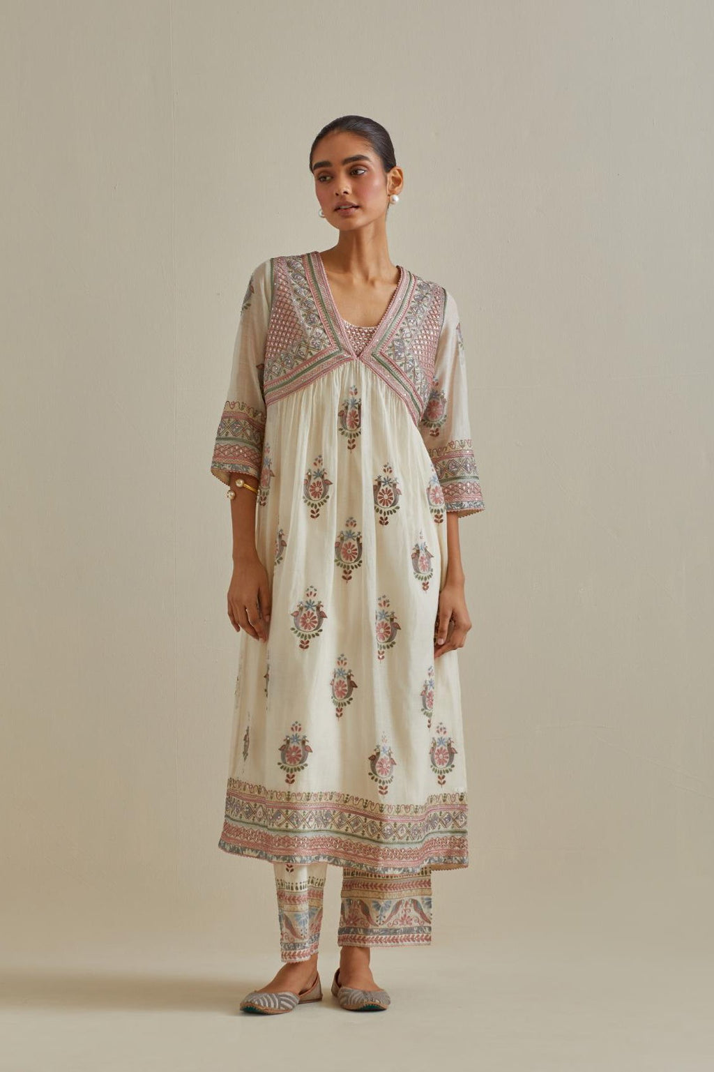 Pink and off-white cotton chanderi embroidered kurta dress set with V neck, yoke and fine gathers at empire line.