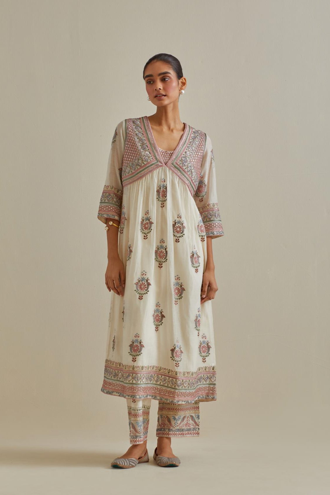 Pink and off-white cotton chanderi embroidered kurta dress set with V neck, yoke and fine gathers at empire line.