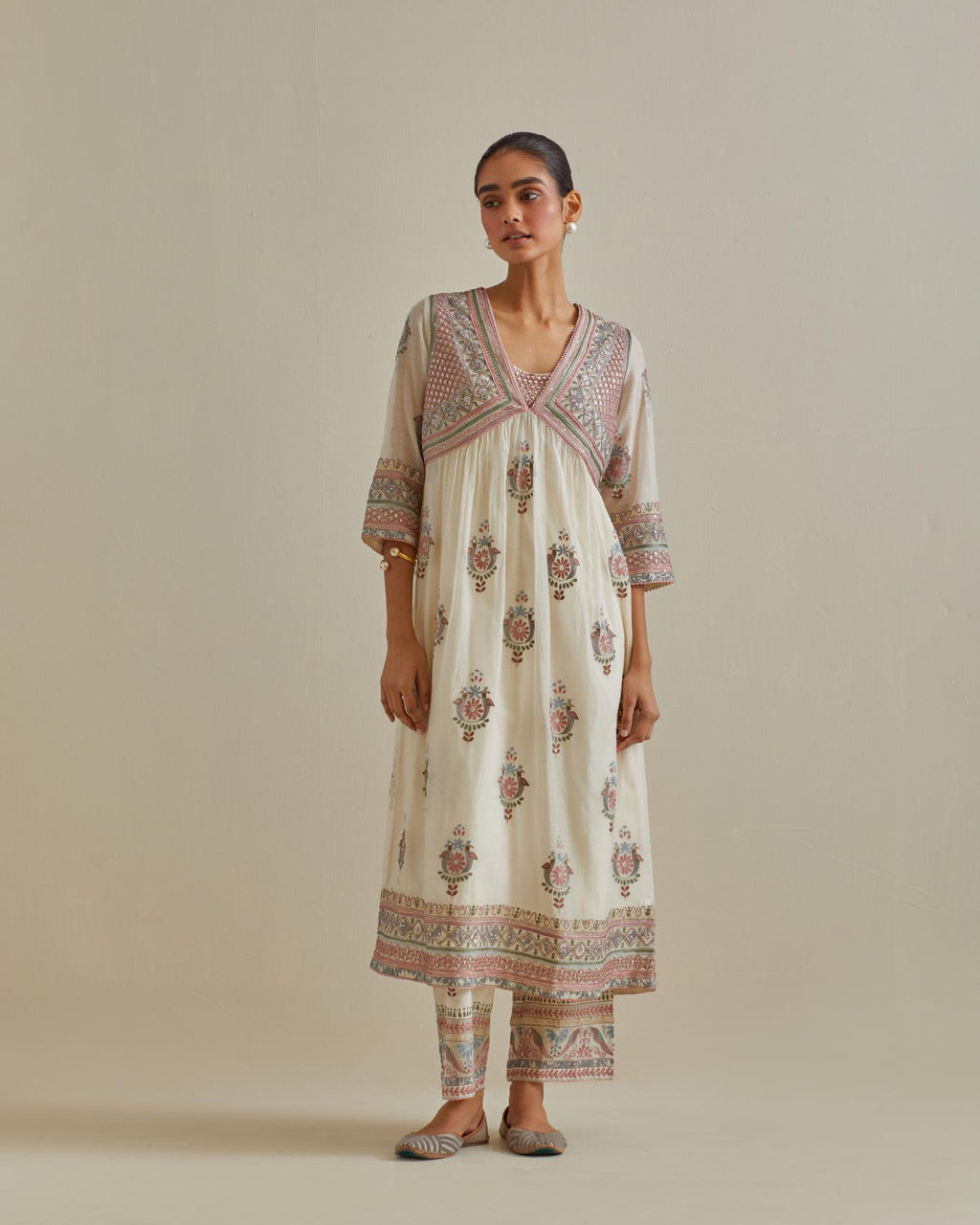 Pink and off-white cotton chanderi embroidered kurta dress set with V neck, yoke and fine gathers at empire line.