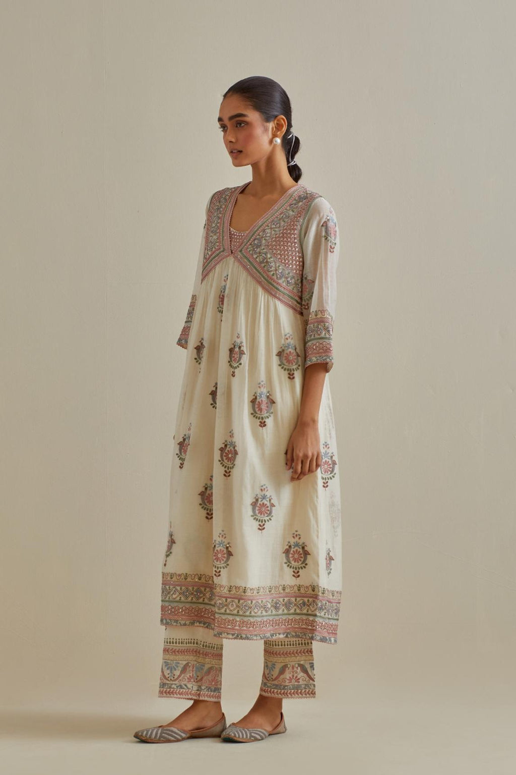 Pink and off-white cotton chanderi embroidered kurta dress set with V neck, yoke and fine gathers at empire line.
