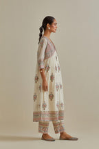 Pink and off-white cotton chanderi embroidered kurta dress set with V neck, yoke and fine gathers at empire line.