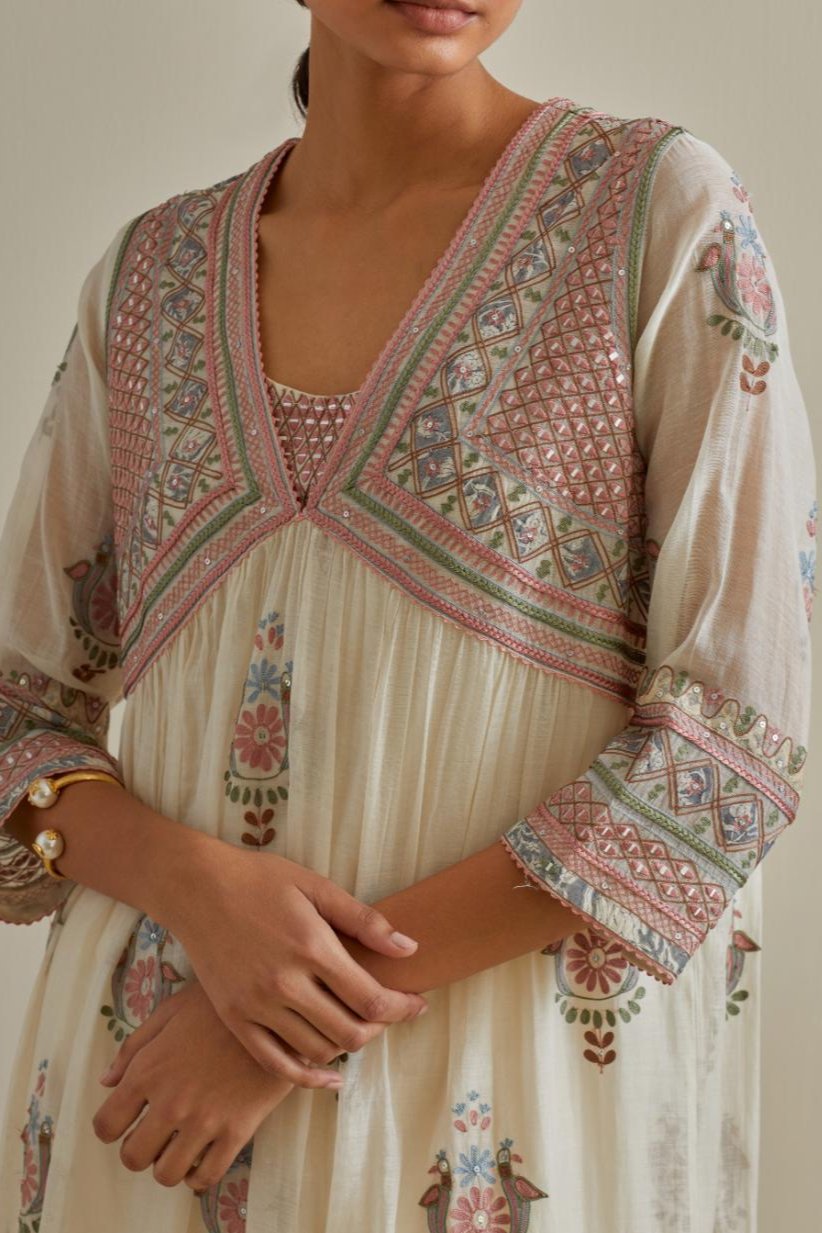 Pink and off-white cotton chanderi embroidered kurta dress set with V neck, yoke and fine gathers at empire line.
