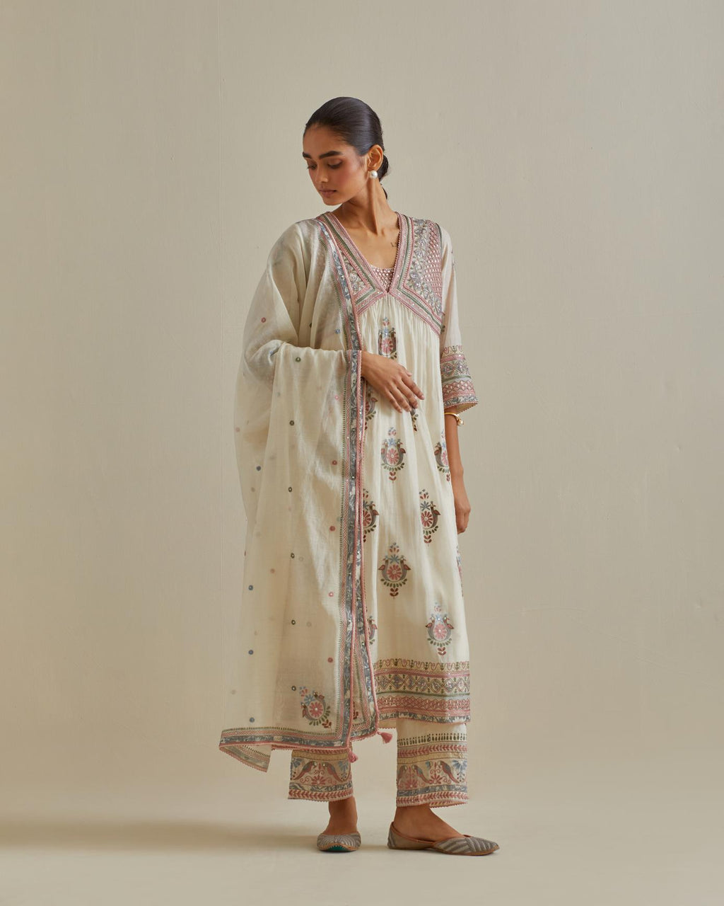 Pink and off-white cotton chanderi dupatta with delicate silk thread embroidery, highlighted with braids, mirrors and sequins work.