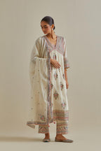 Pink and off-white cotton chanderi embroidered kurta dress set with V neck, yoke and fine gathers at empire line.