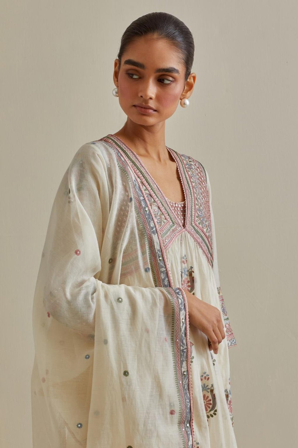 Pink and off-white cotton chanderi embroidered kurta dress set with V neck, yoke and fine gathers at empire line.