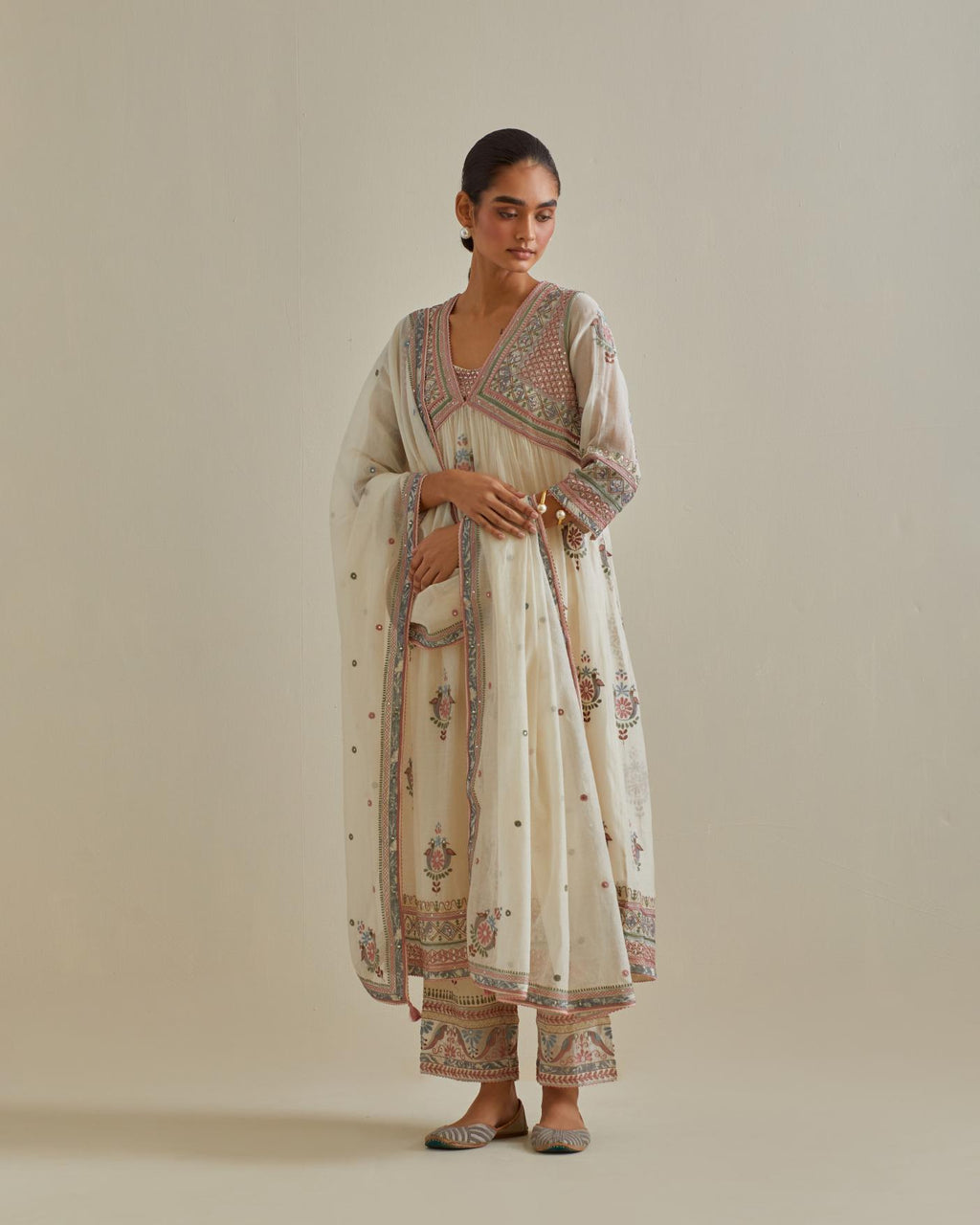 Pink and off-white cotton chanderi dupatta with delicate silk thread embroidery, highlighted with braids, mirrors and sequins work.