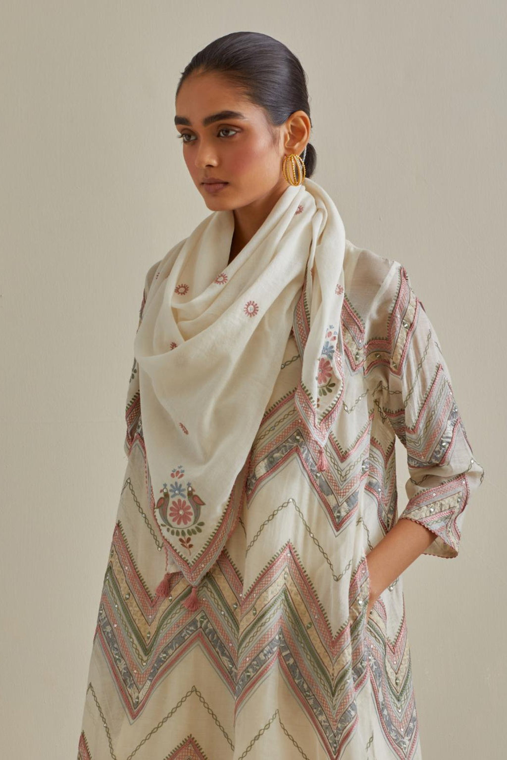 Pink & off-white cotton square scarf with delicate silk thread embroidery, highlighted with braids, mirrors and sequins work.