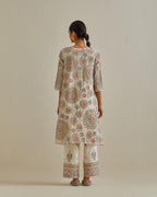 Pink and off-white A-line cotton chanderi kurta set with all over patchwork, silk thread, mirror, tassels and sequin embroidery.