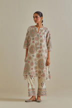 Pink and off-white A-line cotton chanderi kurta set with all over patchwork, silk thread, mirror, tassels and sequin embroidery.