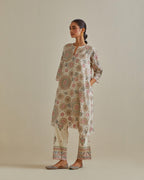 Pink and off-white A-line cotton chanderi kurta set with all over patchwork, silk thread, mirror, tassels and sequin embroidery.