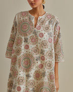 Pink and off-white A-line cotton chanderi kurta set with all over patchwork, silk thread, mirror, tassels and sequin embroidery.