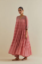 Pink cotton chanderi multi-tiered kurta dress set with 3/4 sleeves, highlighted with mirror work.