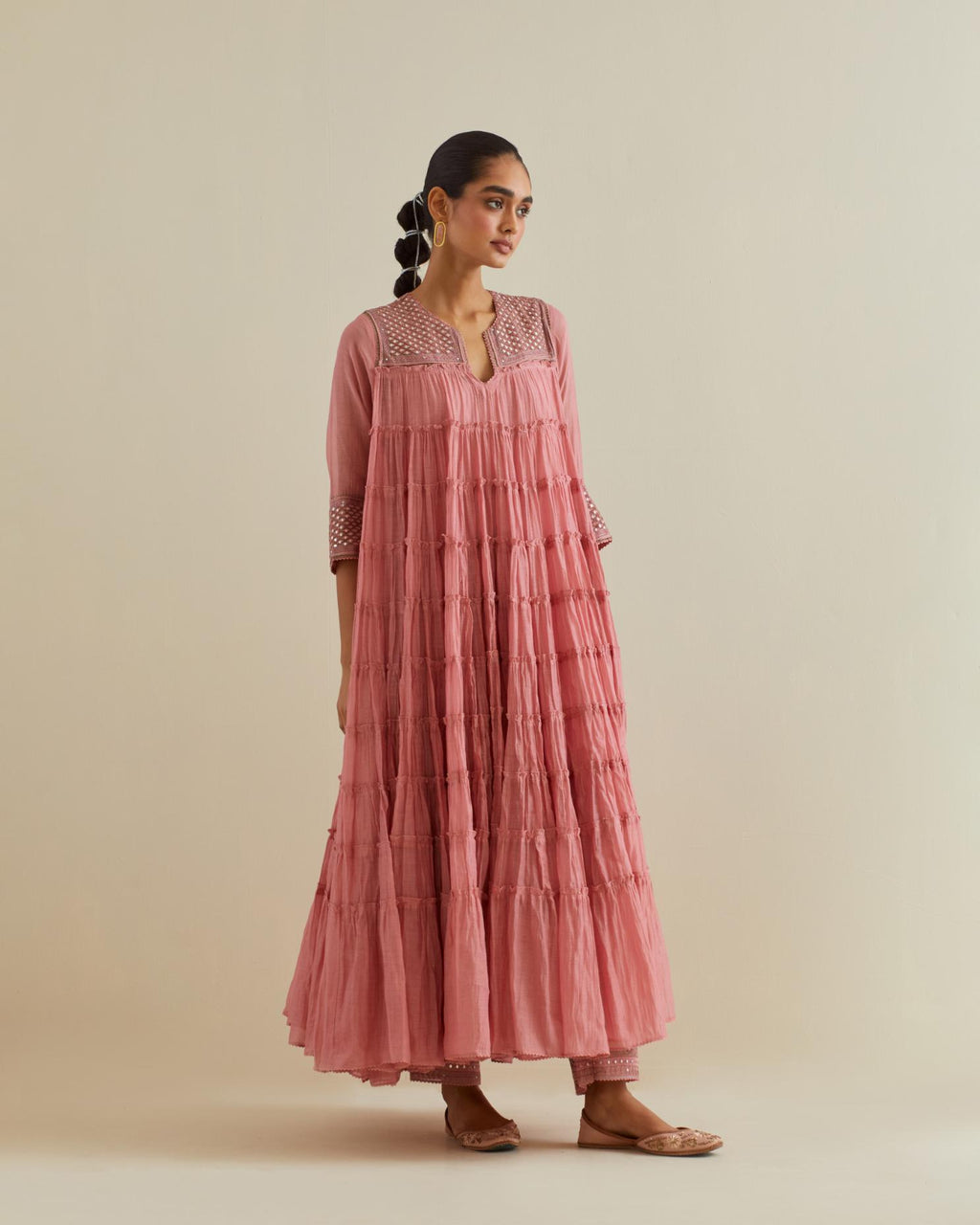 Pink cotton chanderi multi-tiered kurta dress set with 3/4 sleeves, highlighted with mirror work.
