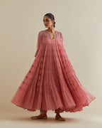 Pink cotton chanderi multi-tiered kurta dress set with 3/4 sleeves, highlighted with mirror work.